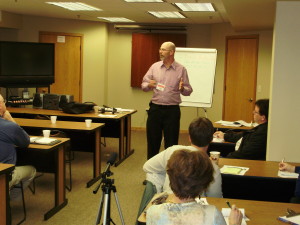 Fort Collins Business Coach Sean McCarthy is coaching small business owners in this photo.